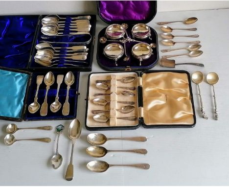 A cased Victorian set of four silver salts with beaded rims, hoof feet and conforming spoons by Hilliard &amp; Thomason, Birm