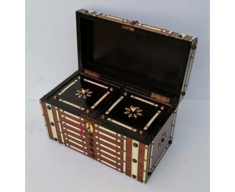 A 19th century ivory bound tea caddy with lidded interior, foil-lined compartments with key, 15 h x 24.5 w x 13 d cm, in very
