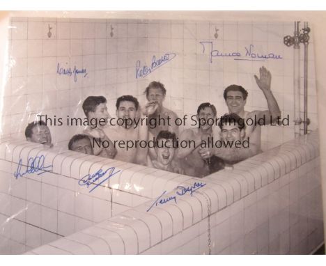 TOTTENHAM 1961      B/W 16” x 12” photo, showing Tottenham players celebrating in the bath after clinching the First Division