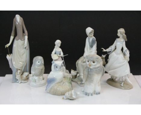 Collection of seven figures to include Lladro Daisa woman with dog (head detached), Lladro seated girl with bird, Lladro girl