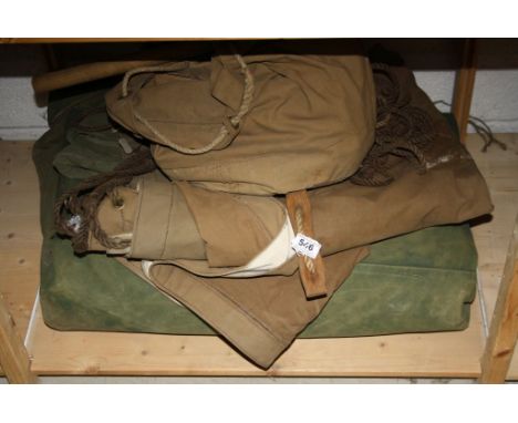 A Vintage Military Tent Complete With Wooden Tent Pegs And Wooden Mallet Together With A Military Camp Bed.