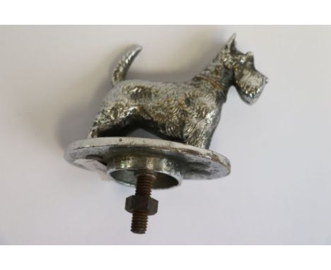 Chrome finished vintage Scottie Dog Car Mascot with screw fittings, marked to base rim "Desmo Copyright", stands approx 7cm n