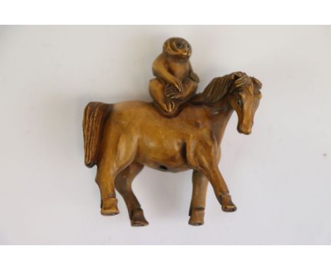 Fruitwood Netsuke of Monkey on Horseback