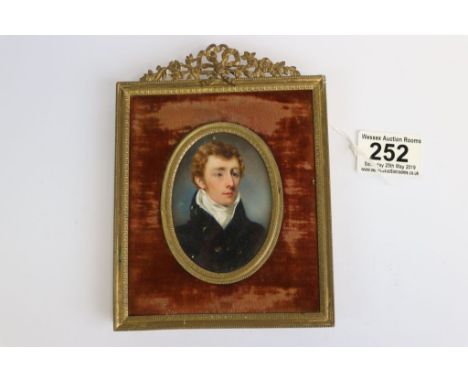 19th Century framed Miniature Portrait of a Gentleman with Gilt metal outer and inner frames and easel style stand, largest d