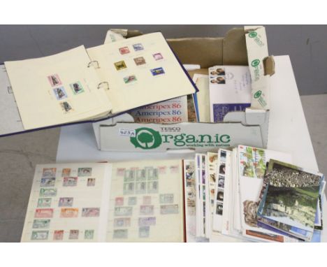 Two Stamp Albums of UK, Commonwealth and World Stamps together with First Day Covers and Postcards