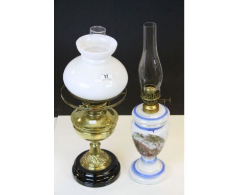 Two vintage Oil lamps, to include Brass with white Glass shade &amp; a Transfer printed White Glass example, the tallest bein