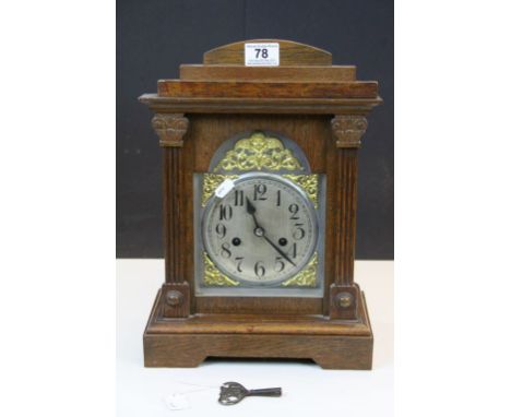 Oak cased Mantle Clock with, glazed front panel &amp; silvered dial, comes with pendulum &amp; key, measures approx  39 x 27 