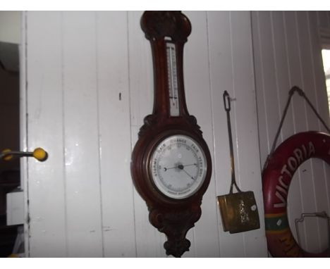 An oak banjo barometer