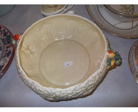 A Clarice Cliff ceramic bowl - fruit & wheat sheaf design