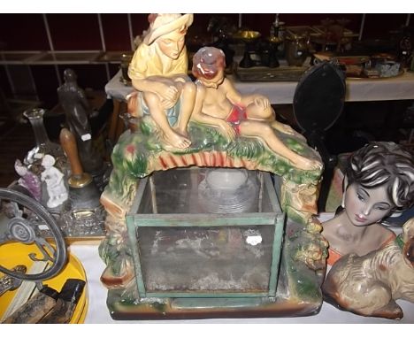 A plaster surround fish tank