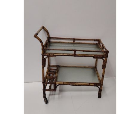 Vintage two-tier bamboo and rattan framed serving trolley, with inset dimpled glass shelves. Collection only. 