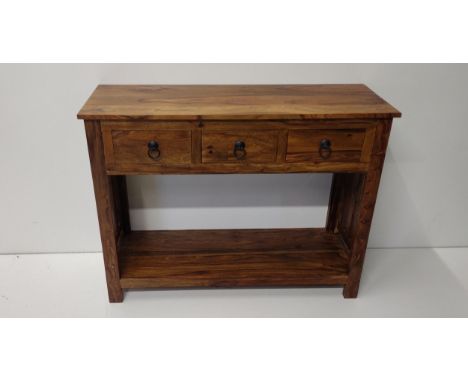 Modern console table featuring 3 drawers with ring pull handles, raised on column legs joined together by lower undershelf. C