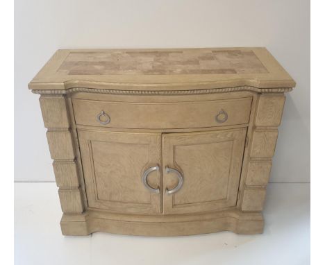 A substantial continental sideboard in crème factory finish. Having inset marble top over two drawers featuring ring pulls, o