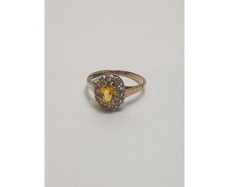 9ct gold citrine and cubic zirconia set ring. Hallmark for Birmingham. Size M½. Shipping Group (A). 