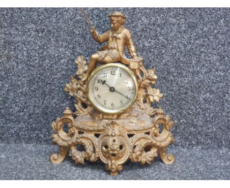 Brass effect ornate figured mantle clock, tamf side England