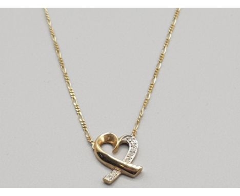 9ct yellow gold diamond heart necklace featuring a figaro link neck chain with yellow gold heart set in the centre 1 side of 