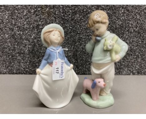 Nao by Lladro: Boy on phone with puppets no 1044, and girl no 12910