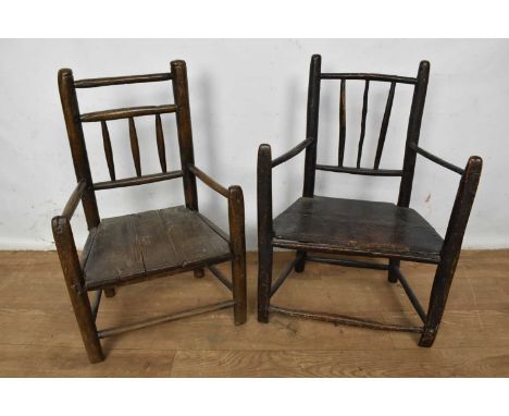 Two 19th century miniature country chairs, the first, with stick back and trapezoidal set on turned legs, 50cm high, the othe