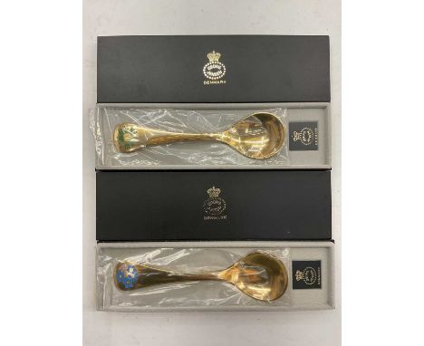 Two Georg Jensen Danish silver gilt and enamelled year spoons- 1982 and 1983, both sealed and boxed