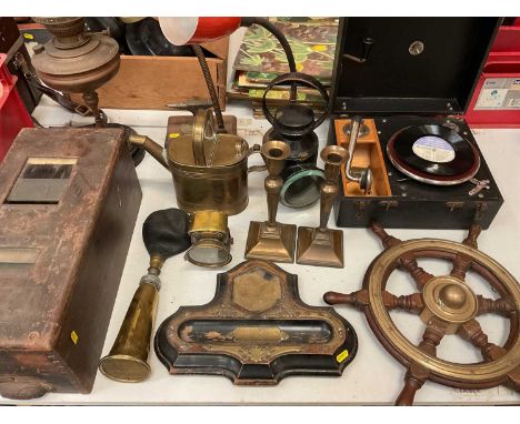 Group of metal wares including a pair of brass candlesticks, lantern, watering can, oil lamp, another desk lamp, portable rec