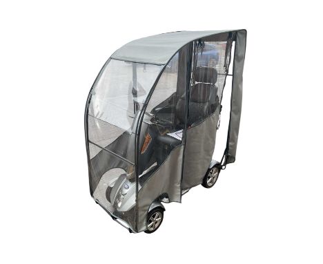 TGA Vita Midi Mobility scooter with canopy together with charger and key   We are currently trying to charge it up Yes it's i