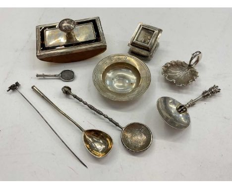 Group of silver and white metal items including a silver Armada dish, Victorian leaf shaped caddy spoon, other spoons, silver