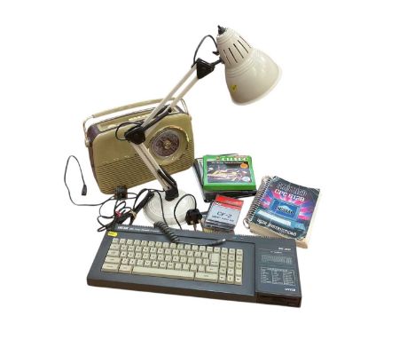 Bush table radio, vintage records, Amstrad computer, records and anglepoise lamp