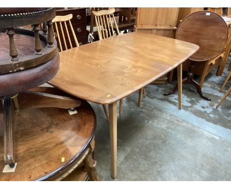 Ercol extending dining table with extra leaf opening to 226cm x 90cm (155cm with no leaf) together with a set of eight Ercol 