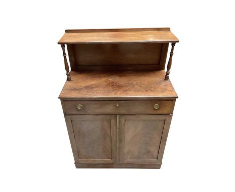 Regency mahogany chiffonier of small size, with shelved superstructure, enclosed below by frieze drawer and pair of panelled 