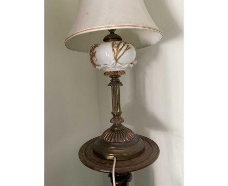 Victorian gilt brass and ceramic lamp, in the manner of Moore Brothers, converted for electricity, the reservoir with nautica