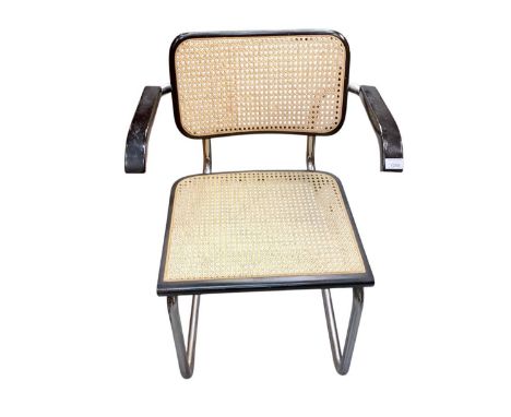 Four vintage 'Cesca' style dining chairs in the style of Marcel Breuer, stamped 'Made in Italy'