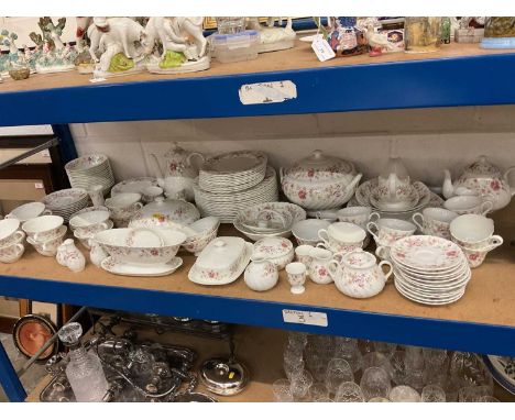 Extensive Wedgwood 'Posy' pattern dinner and tea service, including teapot with 12 cups and saucers, three milk jugs, sugar b