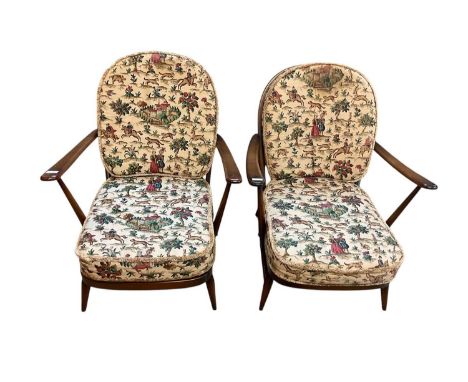Suite of Ercol furniture comprising pair of large armchairs, pair of elbow chairs, rocking chair and a stool (6)