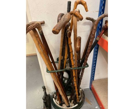 Group of walking sticks in a stick stand