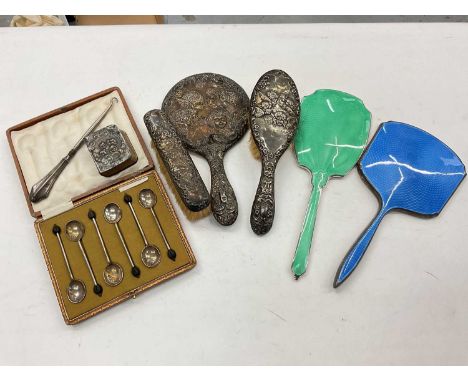 Two silver and enamel dressing table mirrors, set of six silver bean end coffee spoons etc