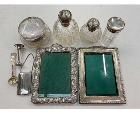 Two Edwardian silver photograph frames, Art Deco silver mounted cut glass powder jar, similar scent bottles etcPlain frame is