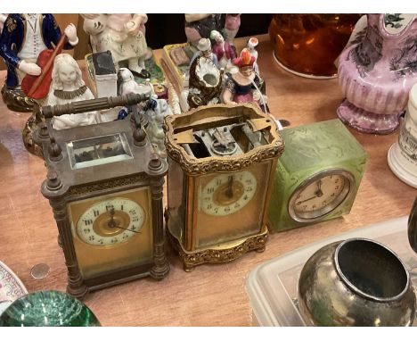 Two carriage clocks together with an Art Deco frosted glass desk clock (3).Extra images are now on our website