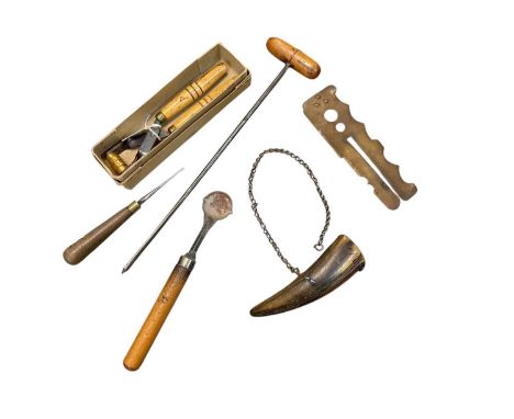 Antique horn powder flask with brass mounts, together with a bullet mould and a small group of gun tools.