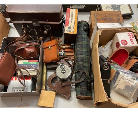 Group of vintage cameras, binoculars and accessories