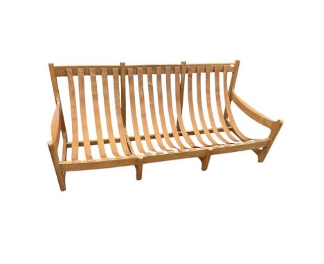 Ercol three seater settee (no cushions) and an Ercol stool (2)