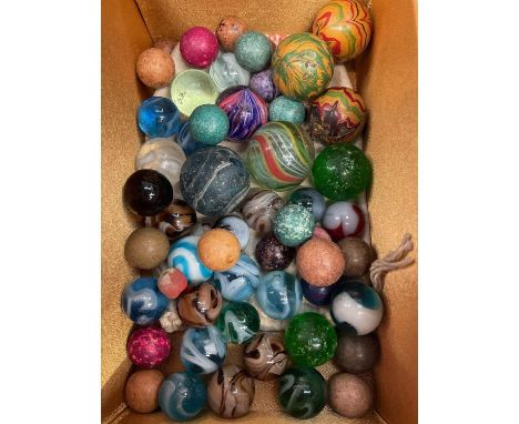 Group of vintage glass and wooden marbles