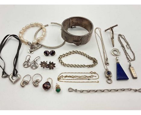 Group of silver and white metal jewellery including a 1930s silver buckle bangle, various pendants, chains, earrings and 9ct 