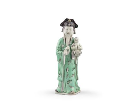 PROPERTIES FROM THE P. COLLECTION OF BISCUIT PORCELAIN WARES  A GREEN ENAMELED BISCUIT FIGURE OF STANDING LUXING  China, Qing