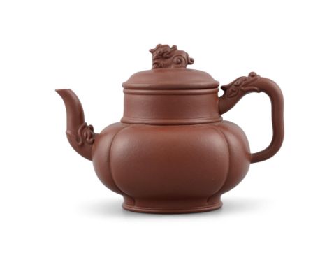 *A TIBETAN STYLE YIXING ZISHA TERRACOTTA TEAPOT AND COVER POSSIBLY BY XU HANTANG 徐汉棠 (1932-) CHINA, 20TH CENTURY Potted after