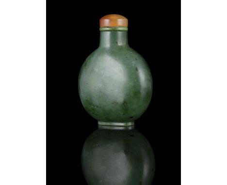 PROPERTIES FROM A FRENCH COLLECTOR OF JADE CARVINGS AND SNUFFBOTTLES  A SPINACH JADE SNUFF BOTTLE OF ROUND SHAPE CHINA, POSSI