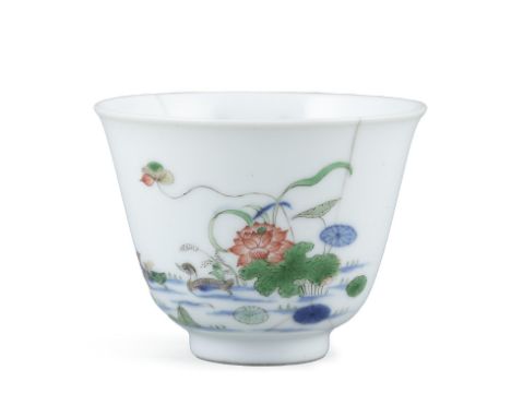 A FAMILLE VERTE 'MONTH' CUP WITH KANGXI MARK BUT LATER  The cup is delicately potted with flaring sides, with the exterior pa
