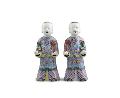 PROPERTIES FROM THE P. COLLECTION OF BISCUIT PORCELAIN WARES  A MIRROR PAIR OF FAMILLE ROSE BISCUIT ENAMELED HEHE / HOHO / ER