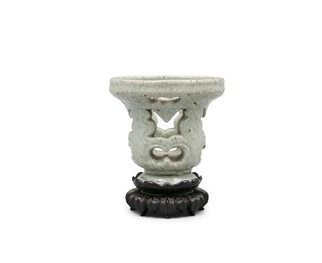A LIGHTLY CRACKLE CELADON GLAZED RETICULATED PORCELAIN NIGHT LAMP OR CENSER  CHINA, POSSIBLY MING DYNASTY OR LATER It rests o