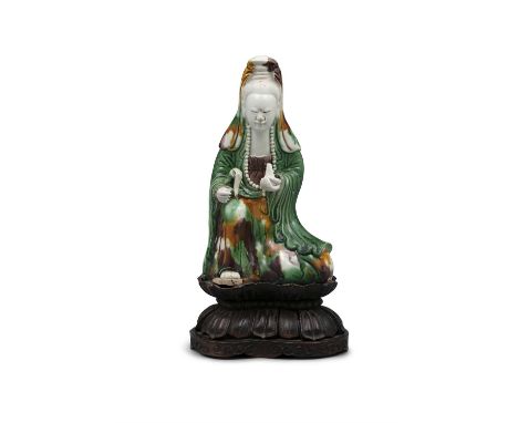 AN EGG AND SPINACH MOLDED BISCUIT PORCELAIN FIGURE OF A GUANYIN CHINA, QING DYNASTY, POSSIBLY KANGXI PERIOD The Goddess of Me