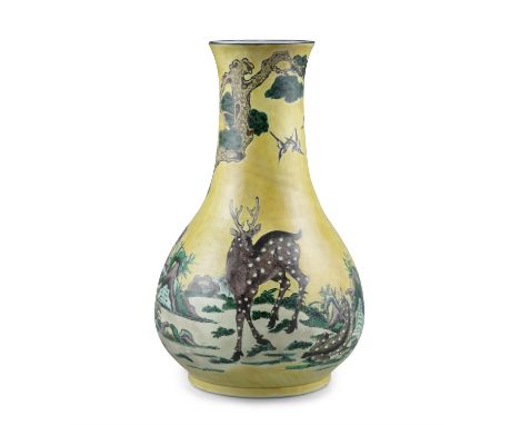 A PORCELAIN ‘DEER’ VASE OF ARCHAISTIC HU SHAPE ARTEMISIA LEAF MARK CHINA, LATE QING DYNASTY, 19TH CENTURY, KANGXI STYLE It re